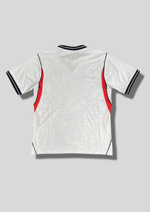 Angleterre 2024 (Training / V2) Blanc, col marine avec insert rouge, détails latéraux rouges et noirs. GoalKits