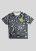 Brésil (Édition Coupe du Monde) Gris et noir, motifs ondulés hypnotiques, logos Nike et CBF en jaune fluo. GoalKits