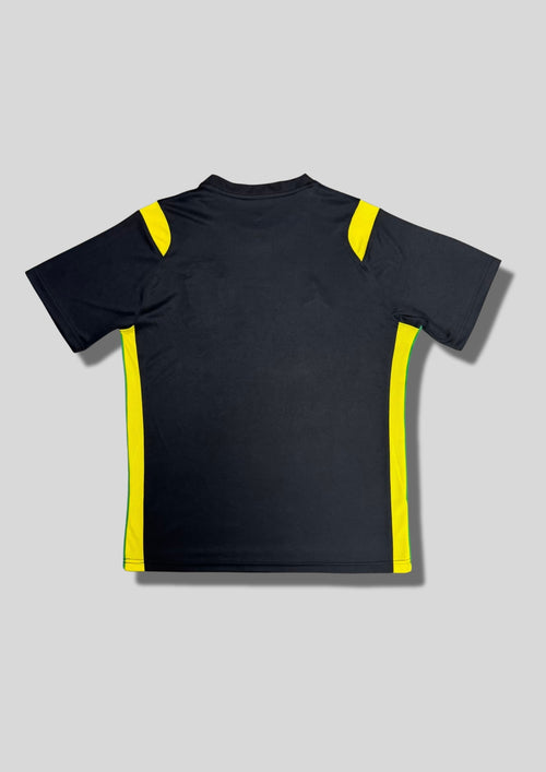 Brésil (Édition Coupe du Monde / Jordan) Noir, détails jaunes aux épaules, logos Jordan et CBF jaunes. GoalKits