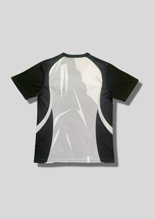 Brésil (Édition Coupe du Monde / Rio) Noir, gris et bleu, illustration du Christ Rédempteur sur fond de montagnes, logos Nike et CBF. GoalKits