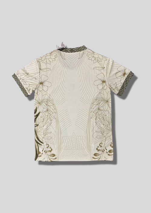 Brésil (Arara) Crème et olive, motifs floraux et tête de perroquet, logos CBF et Nike centrés. GoalKits