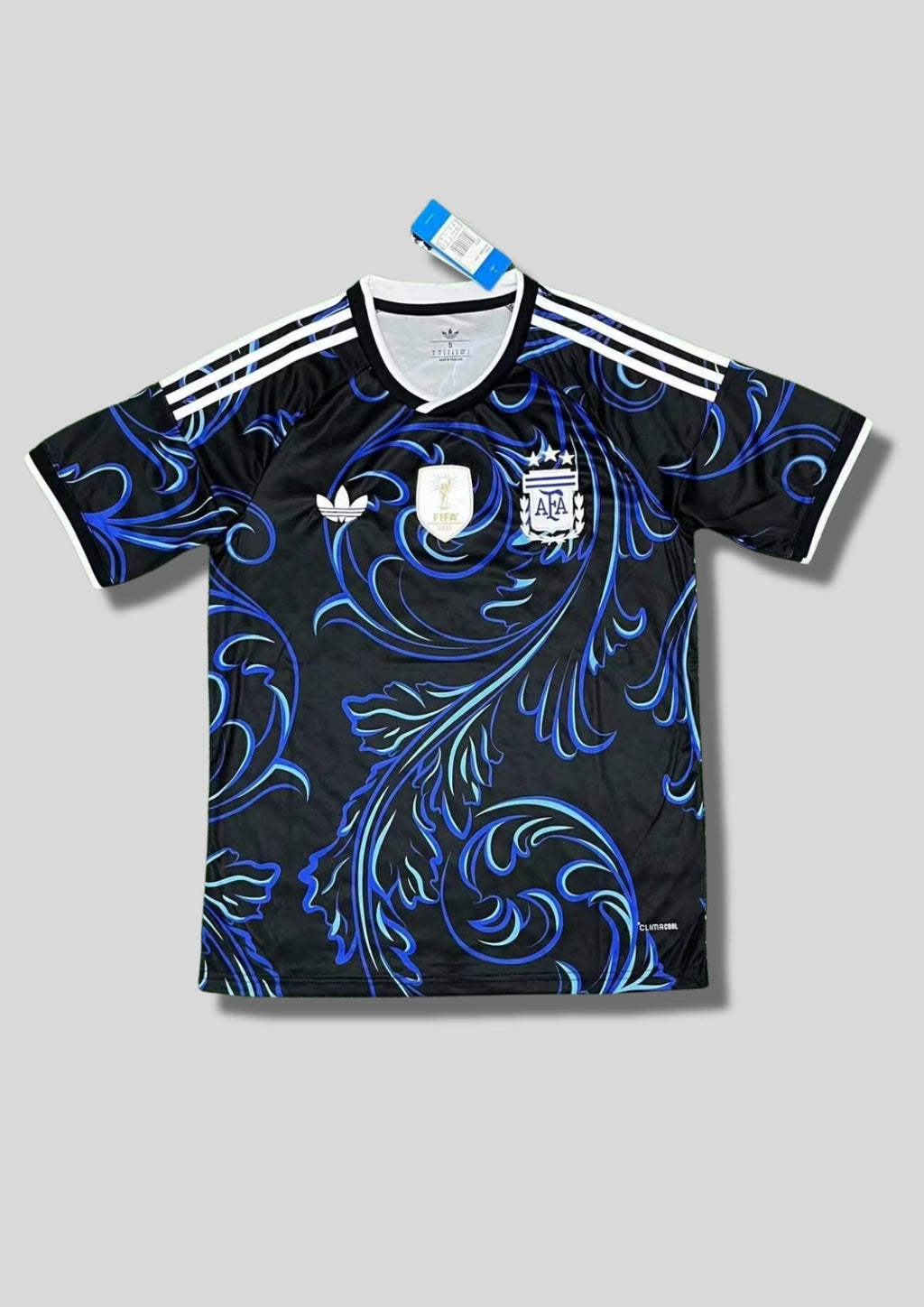 Maillot Argentine AFA – Motifs Floraux Artistiques – Logo Trèfle GoalKits