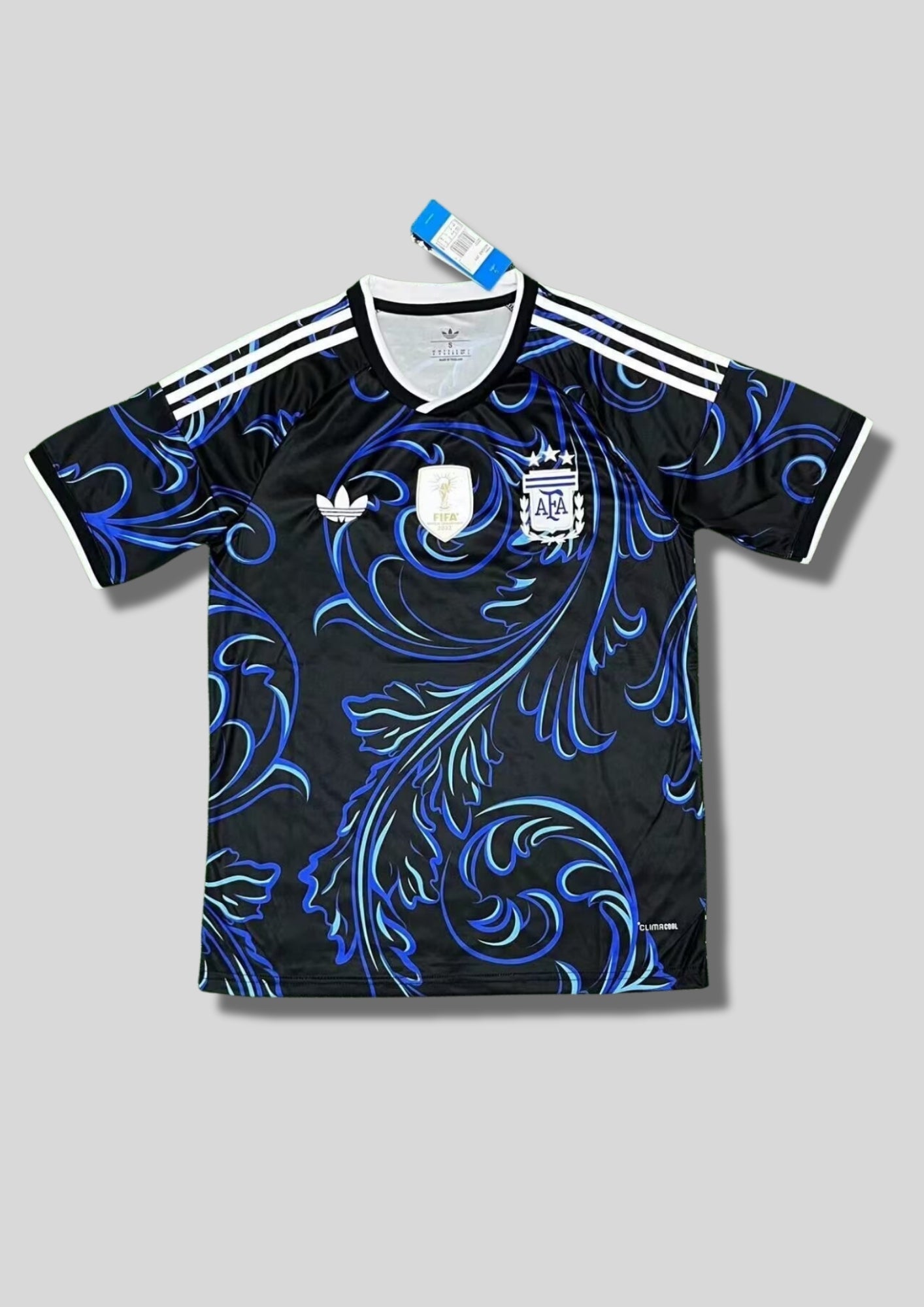 Maillot Argentine AFA – Motifs Floraux Artistiques – Logo Trèfle GoalKits