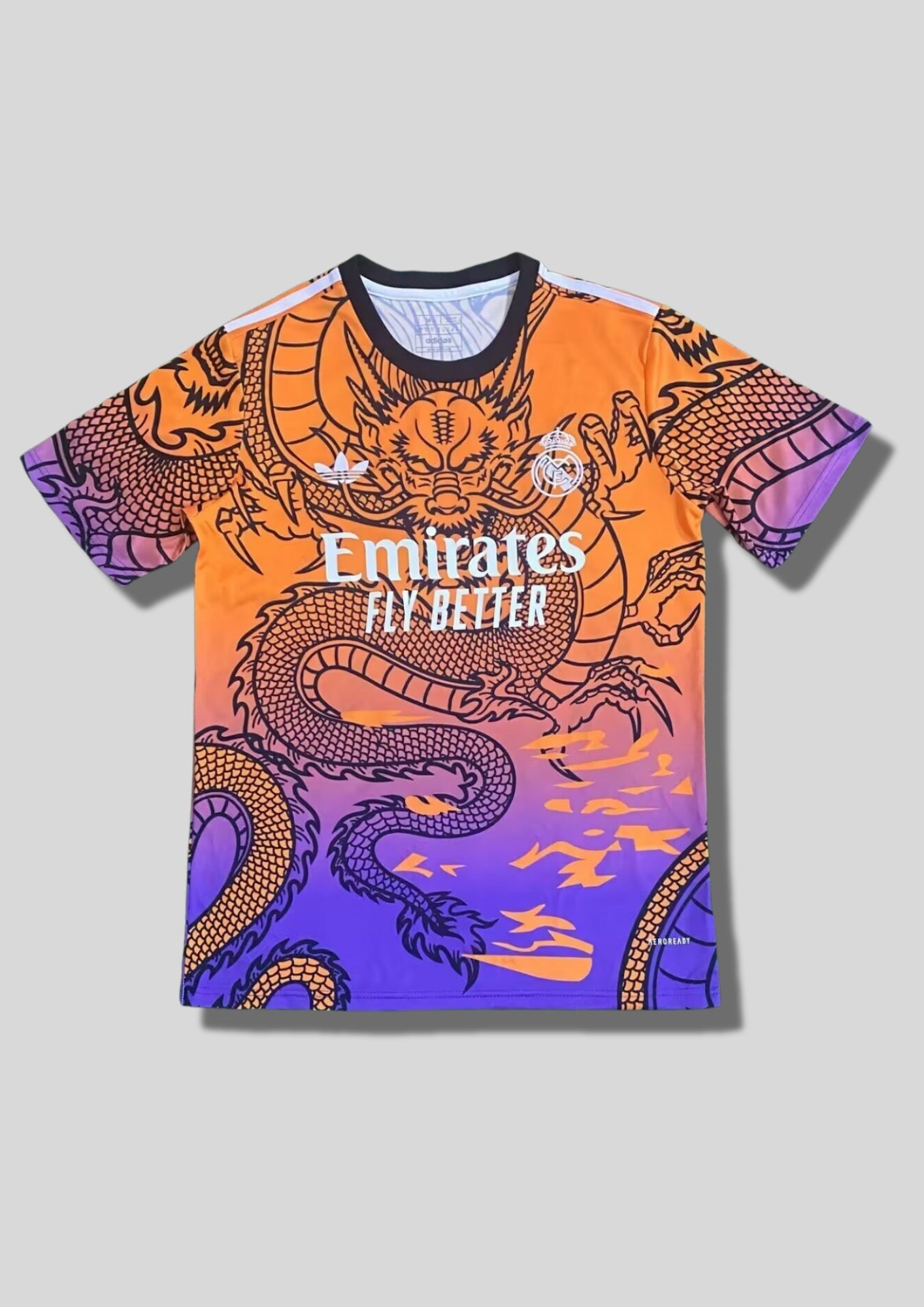 Real Madrid : Maillot d'entraînement / Édition Spéciale – Dégradé orange vers violet avec un immense Dragon japonais aux écailles détaillées. GoalKits
