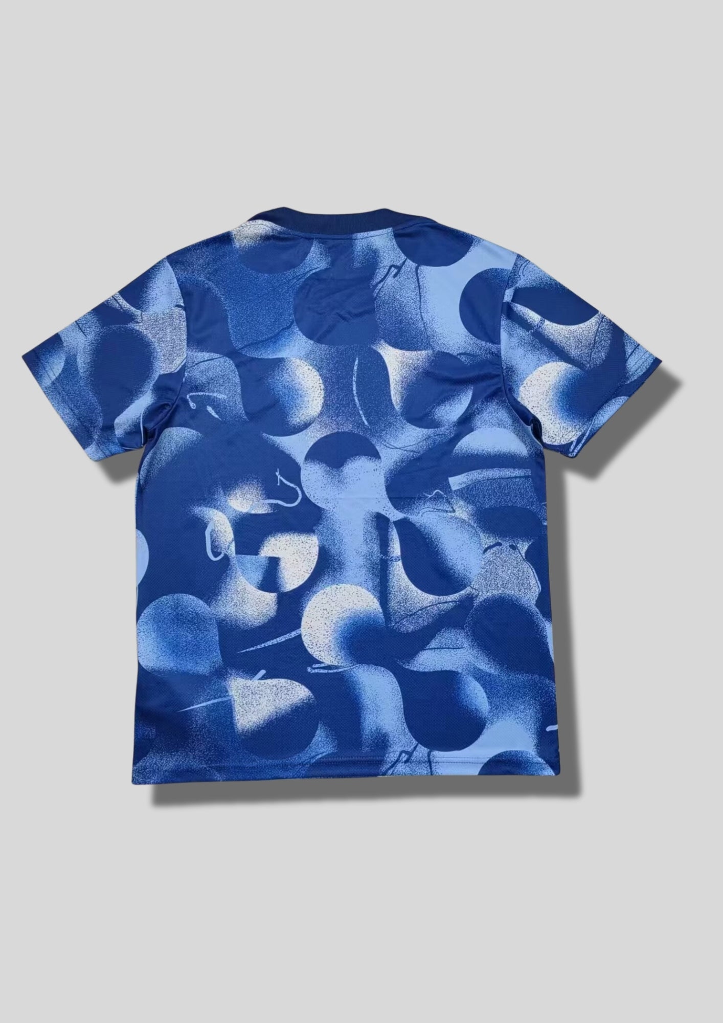 Maillot Bleu Tottenham – Motifs Sphériques Dégradés & Logos Blancs GoalKits