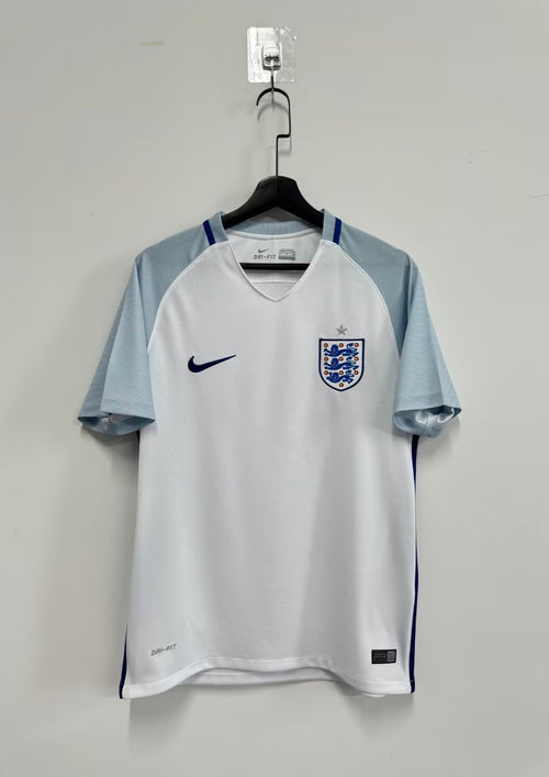 Angleterre Euro 2016 (Domicile) Blanc, manches bleu ciel à rayures fines, col en V et bandes latérales bleu marine. GoalKits