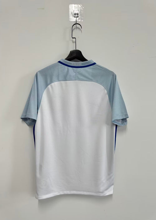 Angleterre Euro 2016 (Domicile) Blanc, manches bleu ciel à rayures fines, col en V et bandes latérales bleu marine. GoalKits