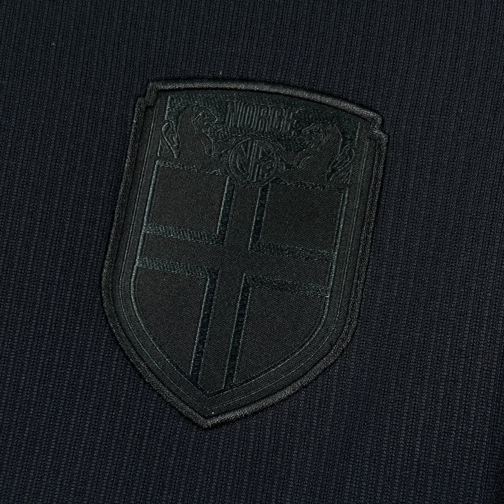 Norvège (Édition Coupe du Monde) Modèle entièrement noir, logos Nike et écusson de la Norvège en monochrome brillant. GoalKits
